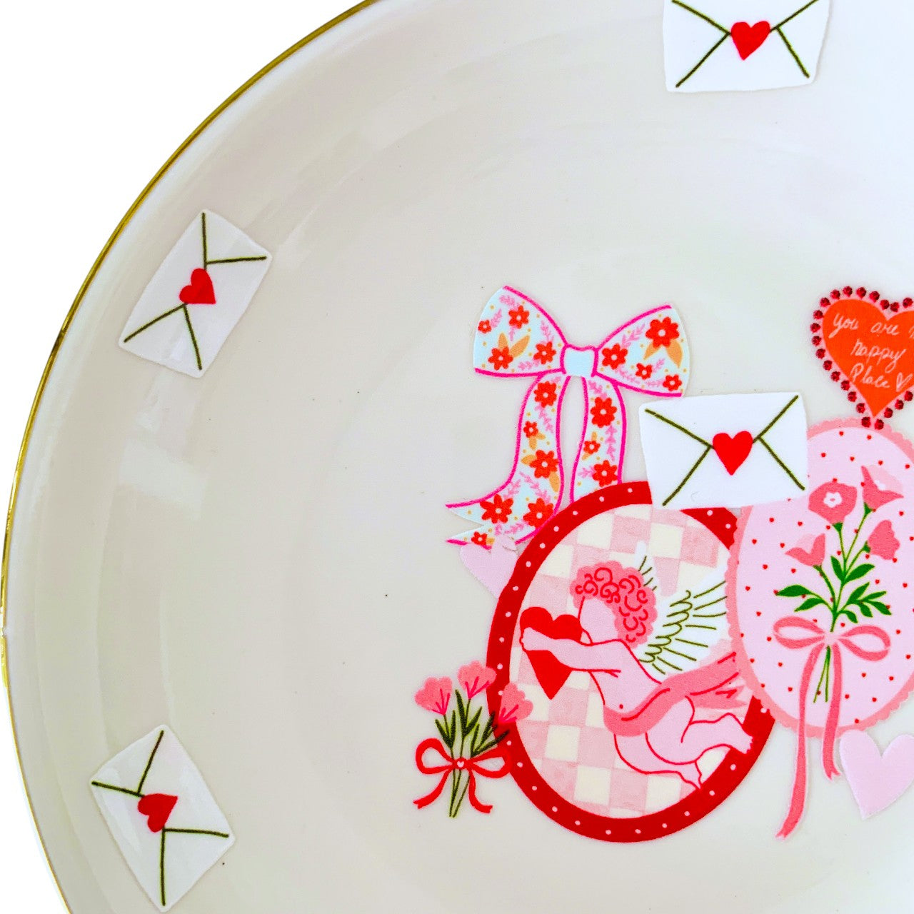 Plato pequeño borde dorado Cupido